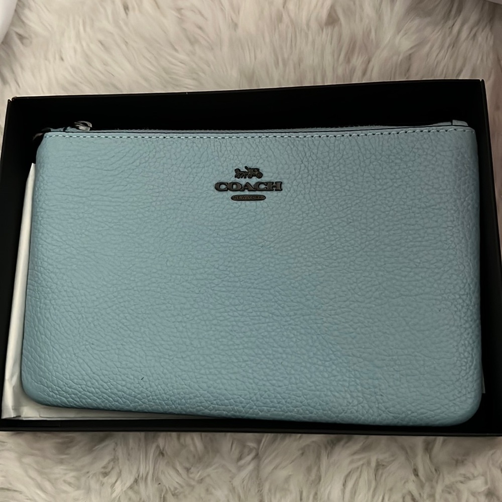 COACH wristlet.